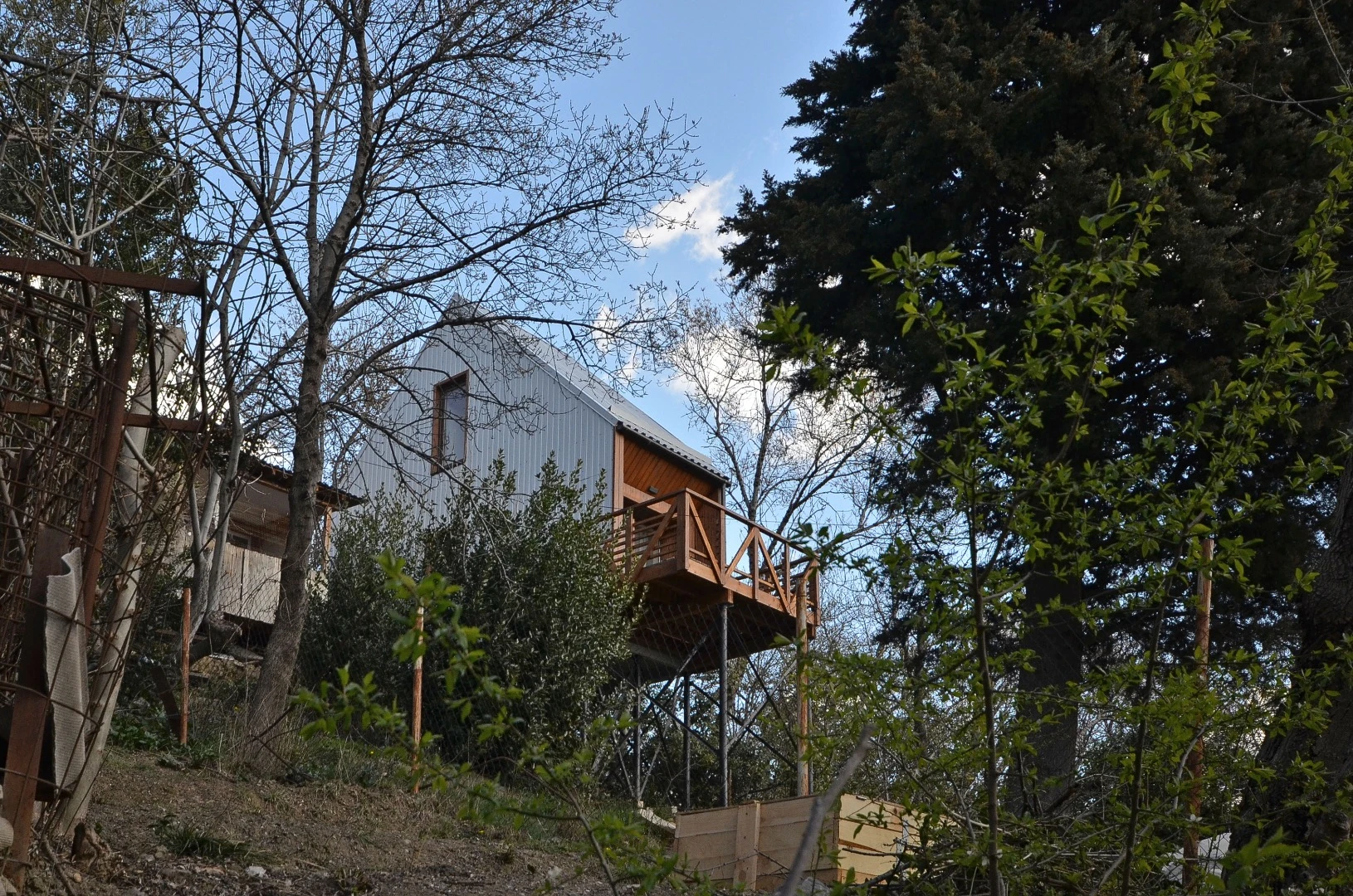 The S22 shown is raised roughly 6 m (20 ft) above the ground on stilts