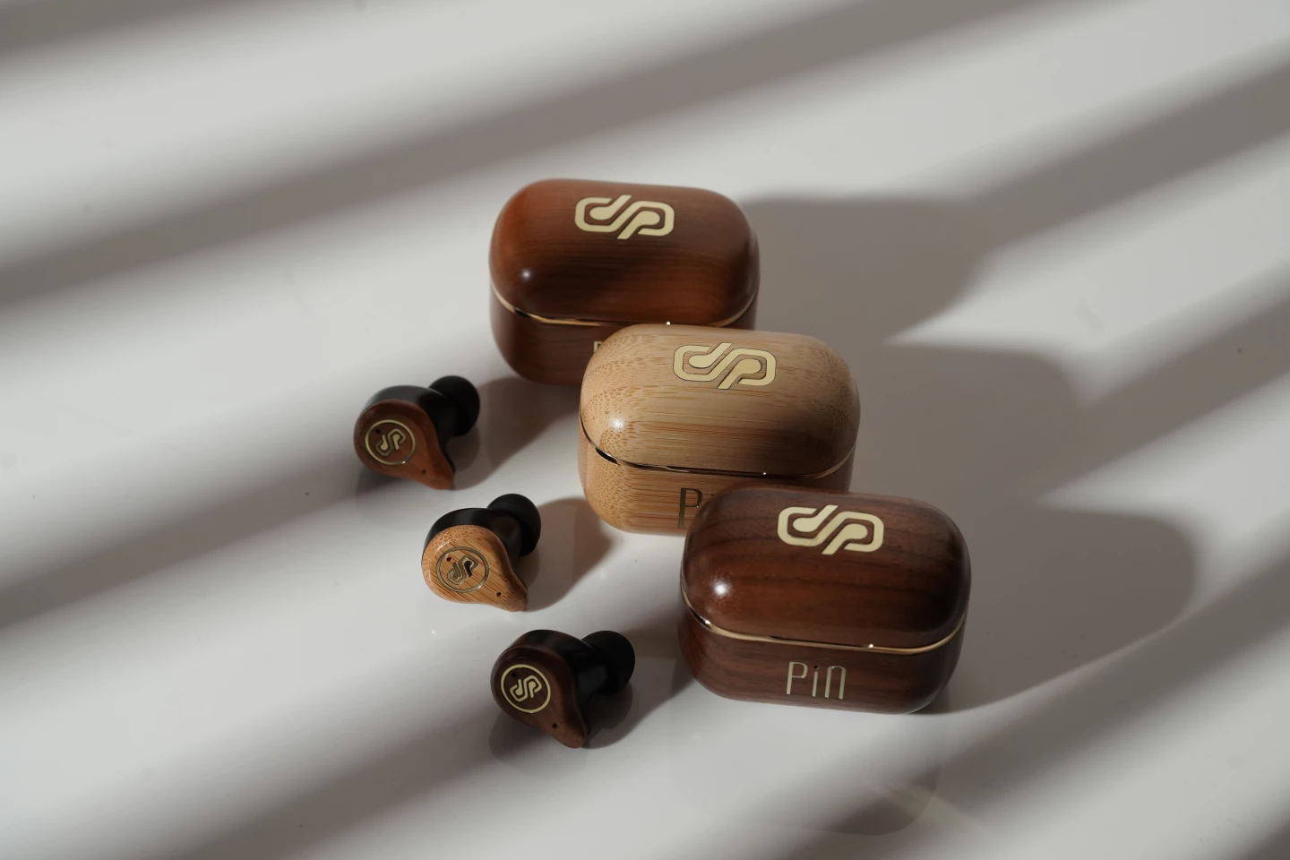 The PIN is available in walnut, cherry and bamboo