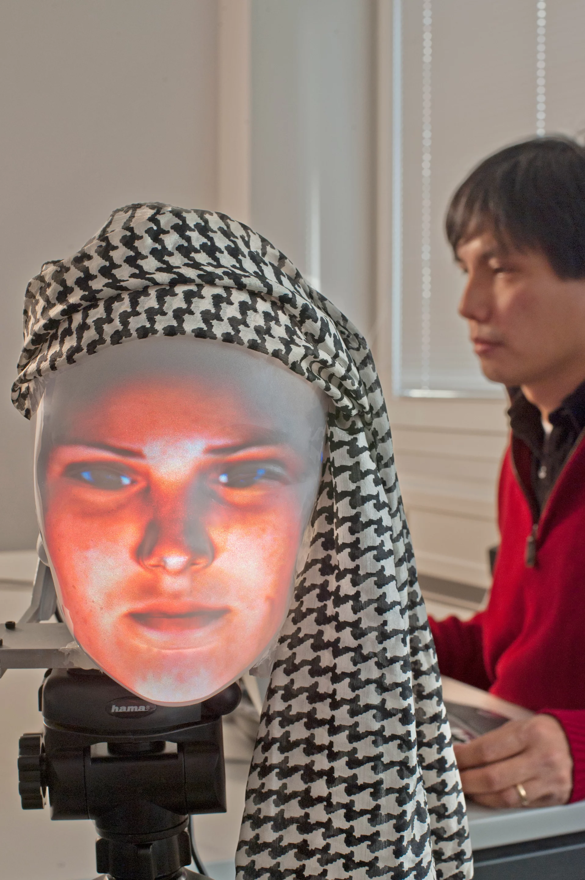 Mask-bot puts a human face on robotics