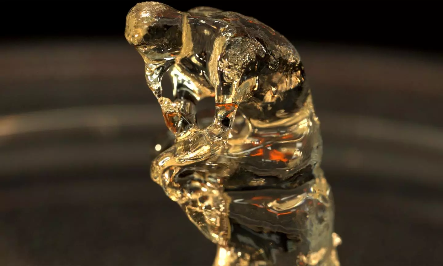 A miniature version of the statue "The Thinker," created using the new 3D-printing system