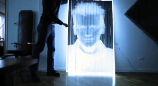 Negatives from the camera have to be taped to a window for inspection after a photograph is taken