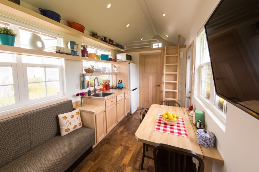 The main living space, with kitchen, dining area, and lounge area