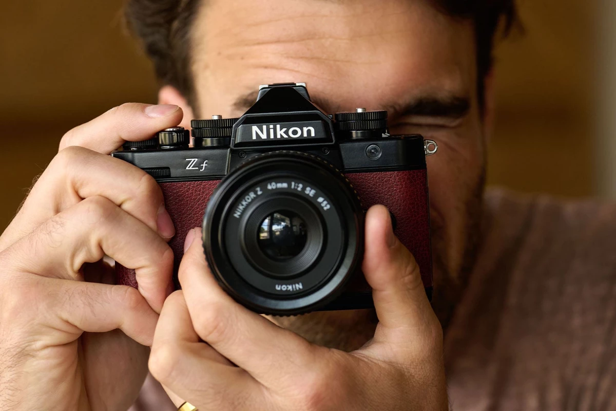 The Nikon Z f mixes old and new for a capable and stylish full-frame memory maker to challenge the retro camera chops of OM Digital and Fujifilm