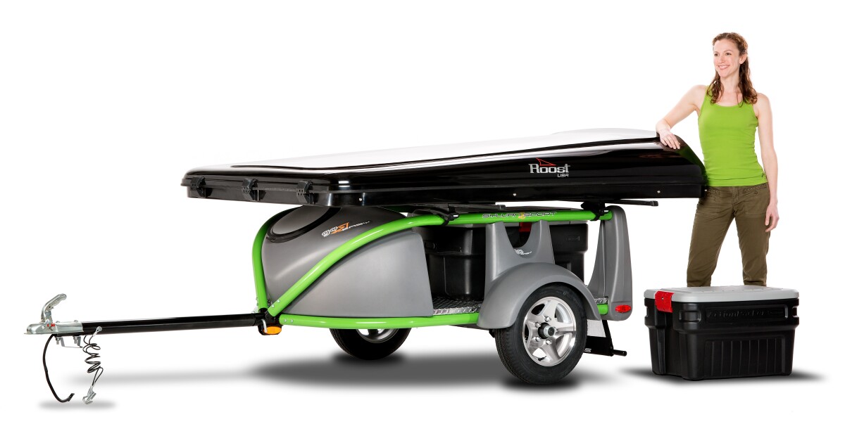 GO Easy ultralight trailer/camper rides behind a motorcycle or small car