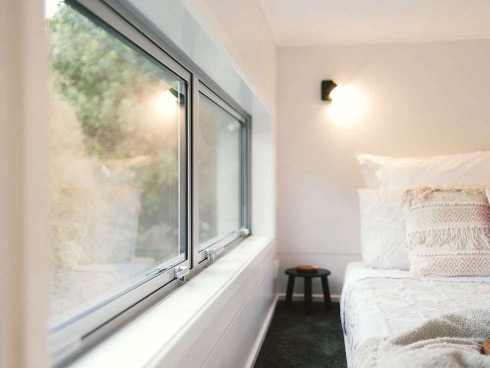 The Buster Tiny House's loft bedroom