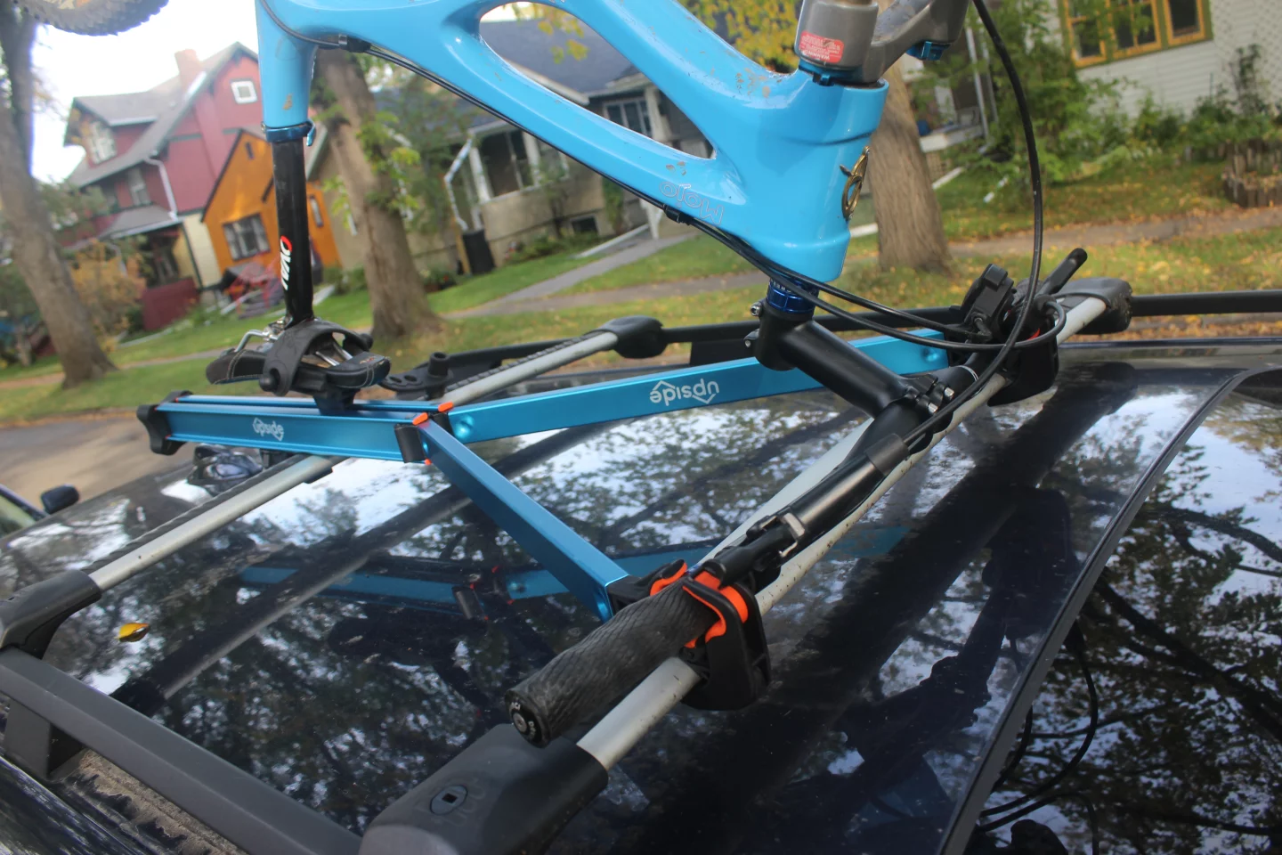 The Upside Rack works best with permanently-installed roof racks, as opposed to those that clamp onto the car's door sills
