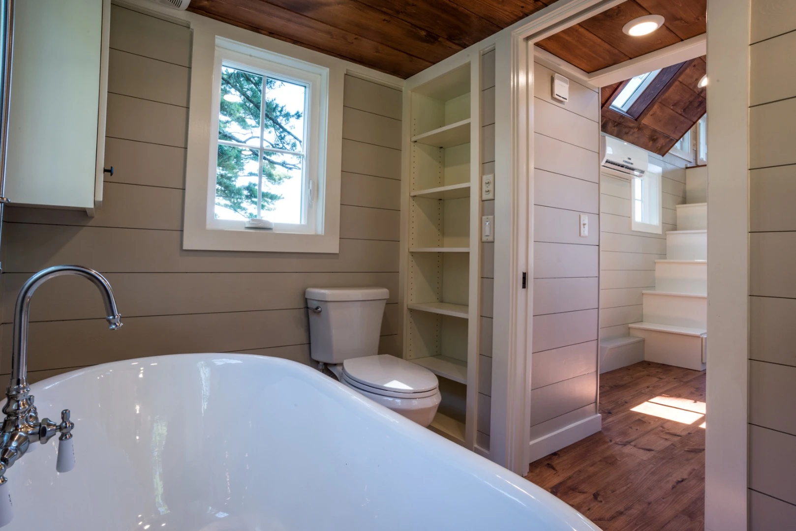 The Ridgewood's bathroom also includes toilet and sink