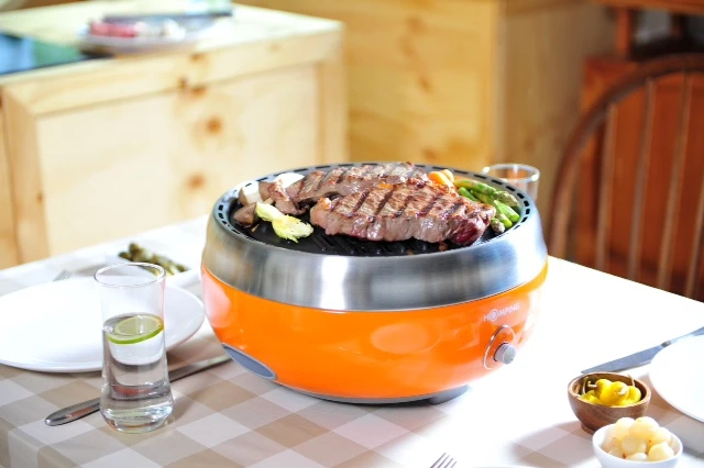 The Homping Grill uses a fan-assisted charcoal design for a combination of flavor and convenience