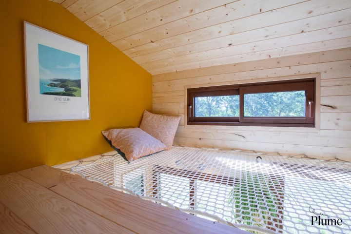 Plume maximized every inch of the Cosmos' available space with a clever layout that includes a netted floor area upstairs