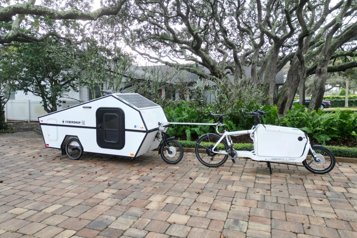 The Cyberdrop prototype with its designer's motorized Bullitt cargo bike