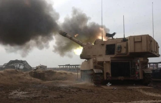 The unit which the NLOS-C is designed to replace - the Paladin 155-mm mobile Howitzer fires during a drill.