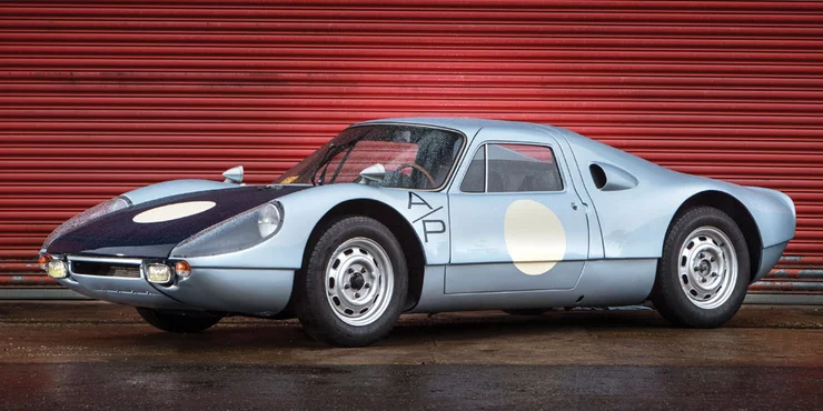 Designed by Ferdinand A. Porsche, (grandson of founder), the two-seat Type 904 competition coupe utilized a mid-engine boxed steel ladder tubing frame and composite body panels bonded to the frame, creating a semi-monocoque. In its inaugural 1964 season, the 904 GTS won at Sebring, the Targa Florio, Spa, the Nürburgring 1000 KM, the 24 Hours of Le Mans (a 1-4 class sweep), the 12 Hours of Reims, the Coppa Inter-Europa, the Tour de France, the Bridgehampton 500 KM, and the 1000 KM of Paris. In U.S. amateur racing, the 904 was considered potent enough to be classed with the much more powerful big block Corvettes and Cobras, and it still acquitted itself admirably. Porsche produced just over 100 of these exquisite coupes, before it was superceded by the space-framed 906. This 1965 Porsche 904 Carrera GTS was sold by RM Auctions for US$1,650,000.