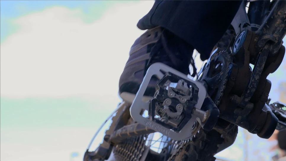 By attaching cleats to the underside of the FlyPedal adapter, they will clip in and out of the clipless pedals in much the same way a pair of bike shoes would