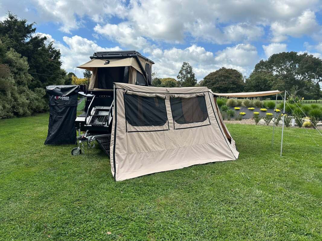Sprawling camper fortress collapses into impenetrable lockbox trailer