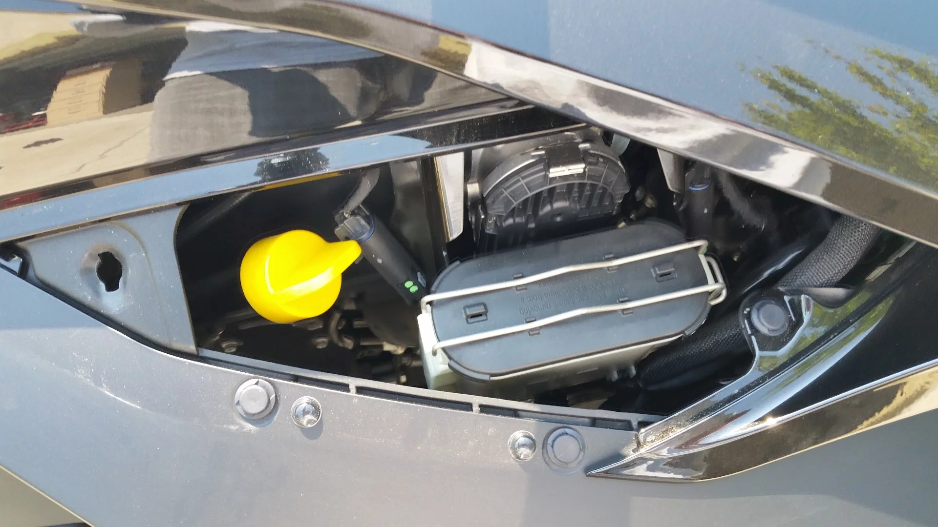 Fluids are easy to check with the removal of one of the side panels up near the gas tank