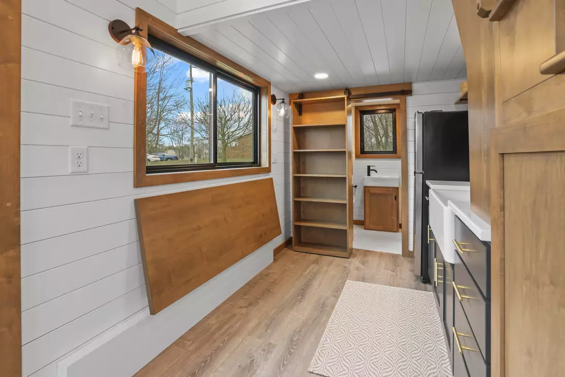 The Coastal Modern's dining table can be folded away to gain some extra floorspace