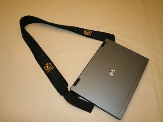 Close screen to secure The Lapstrap in place