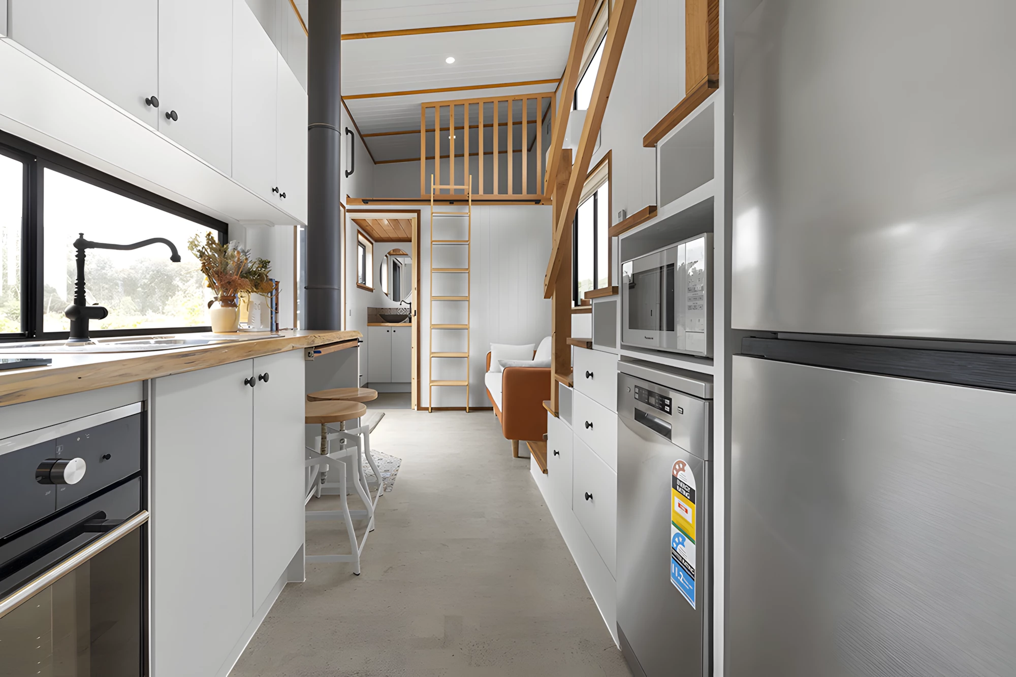 The Grevillea's kitchen is well-stocked and includes a full-size oven and fridge/freezer