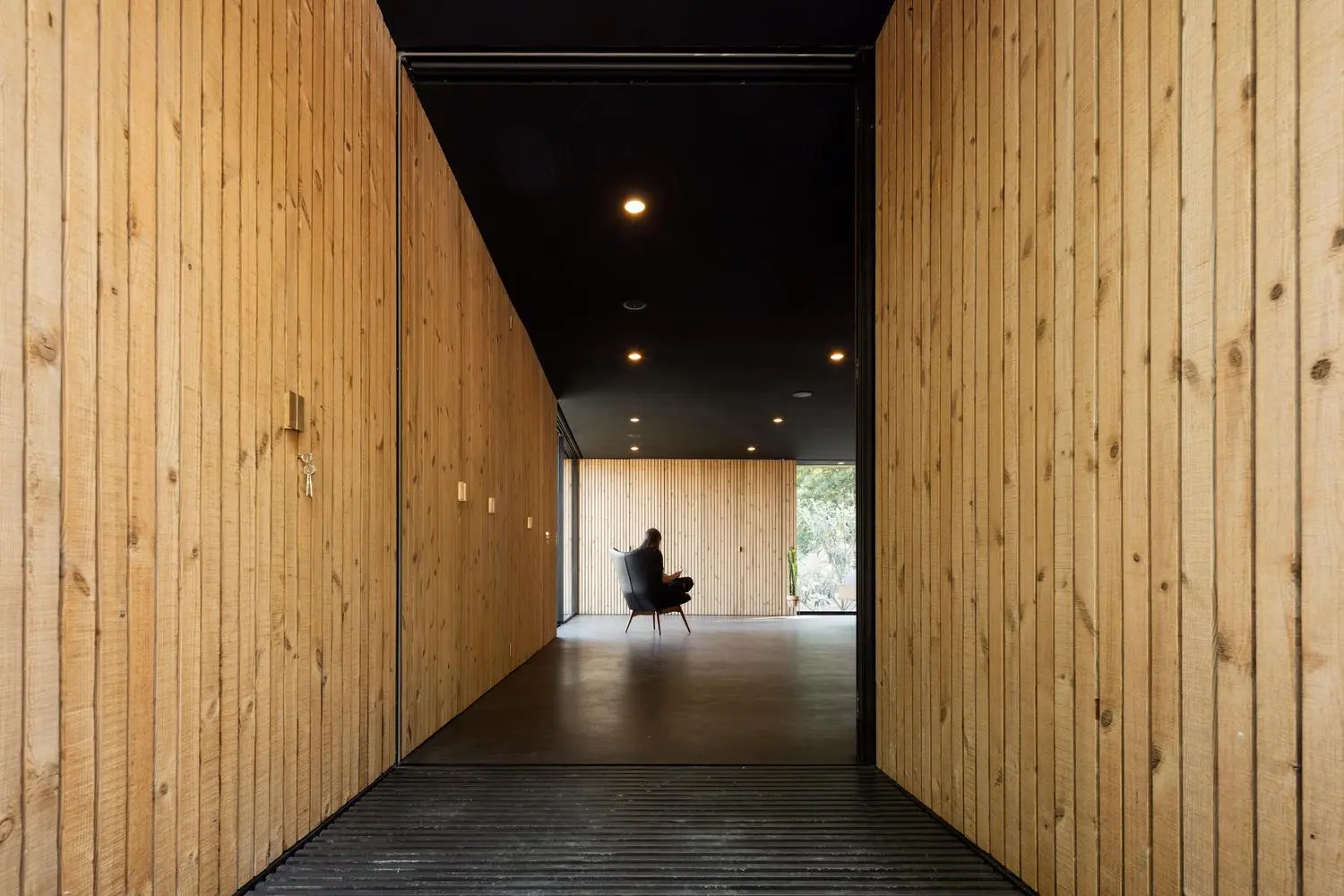 Entrance of the Pavilion House reflects the home's interior and exterior