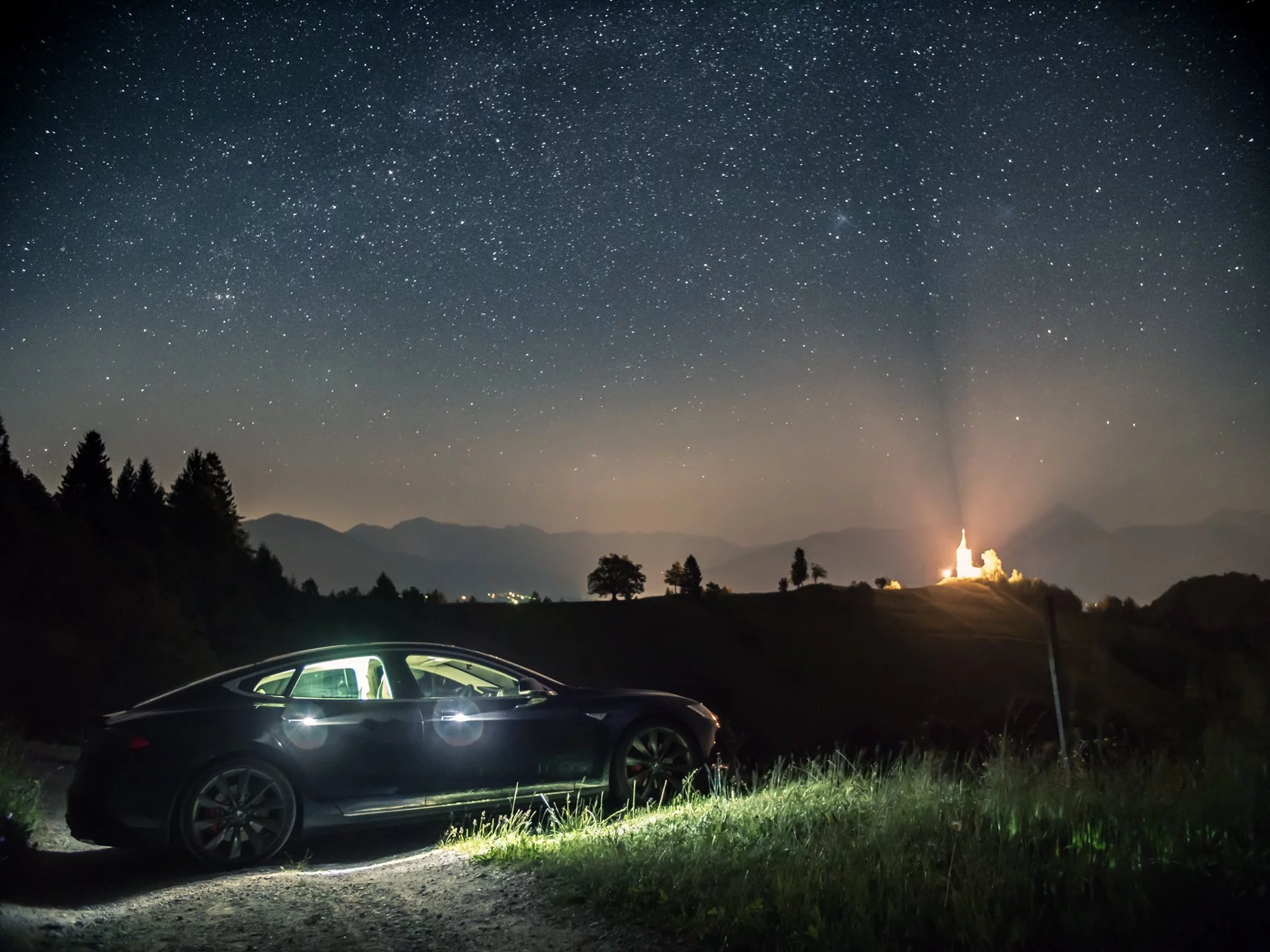 With Tesla's "Party & Camper" mode, you can use the battery with the car parked, powering select systems like climate control, audio and lighting