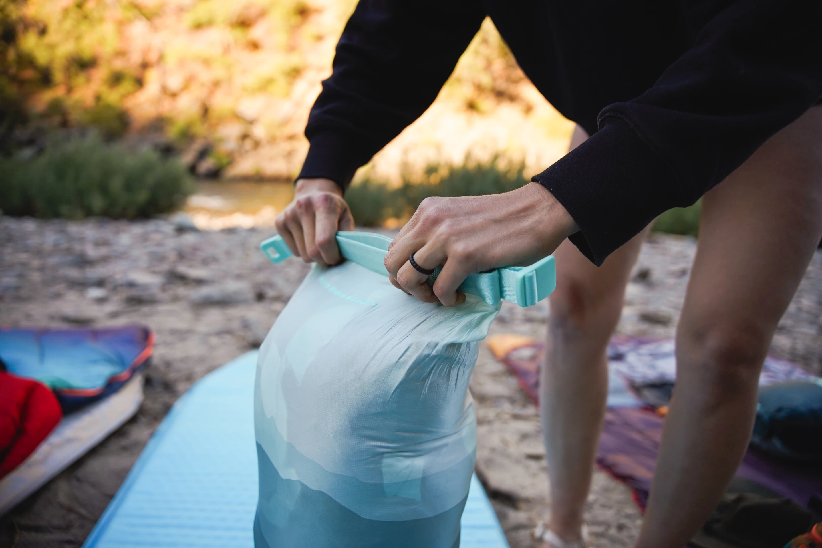 Strapping down the stuff sack closure