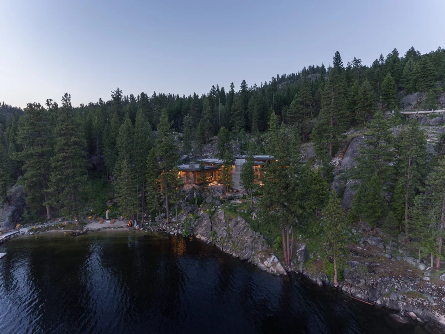 The Cliff House sits on property that features discrete rocky walkways that wind down to the lakeshore