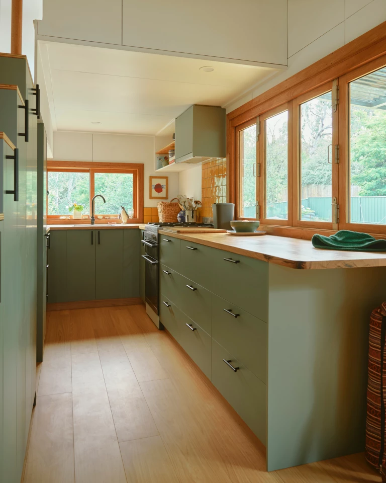 The Caladenia tiny house kitchen includes lots of storage for a model of its size