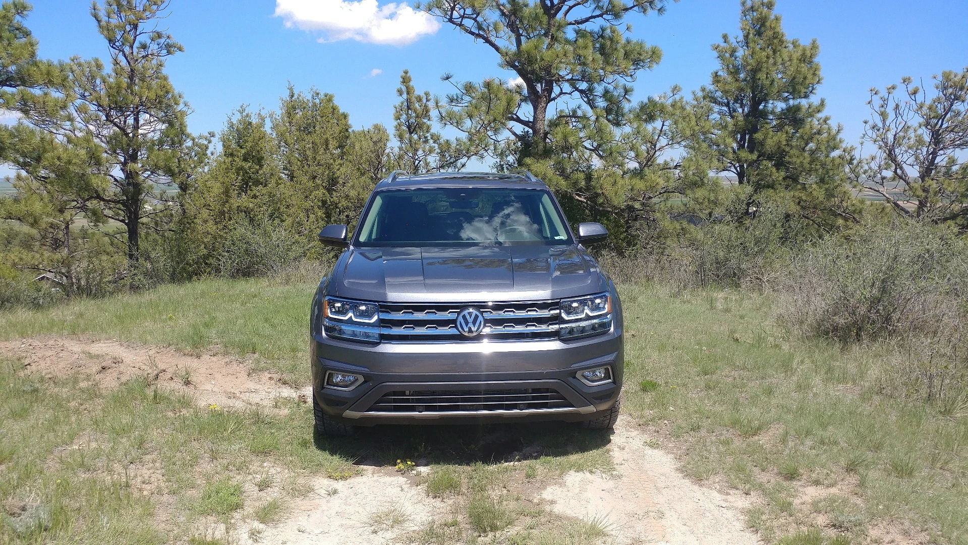 The flat-faced, two-slot grille, squared headlamps, and decidedly truck-like fascia all seem designed to emphasize the bulk of the Atlas