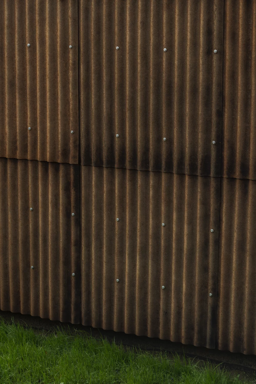 The home is uniquely clad with hemp fiber and sugar resin corrugated sheeting