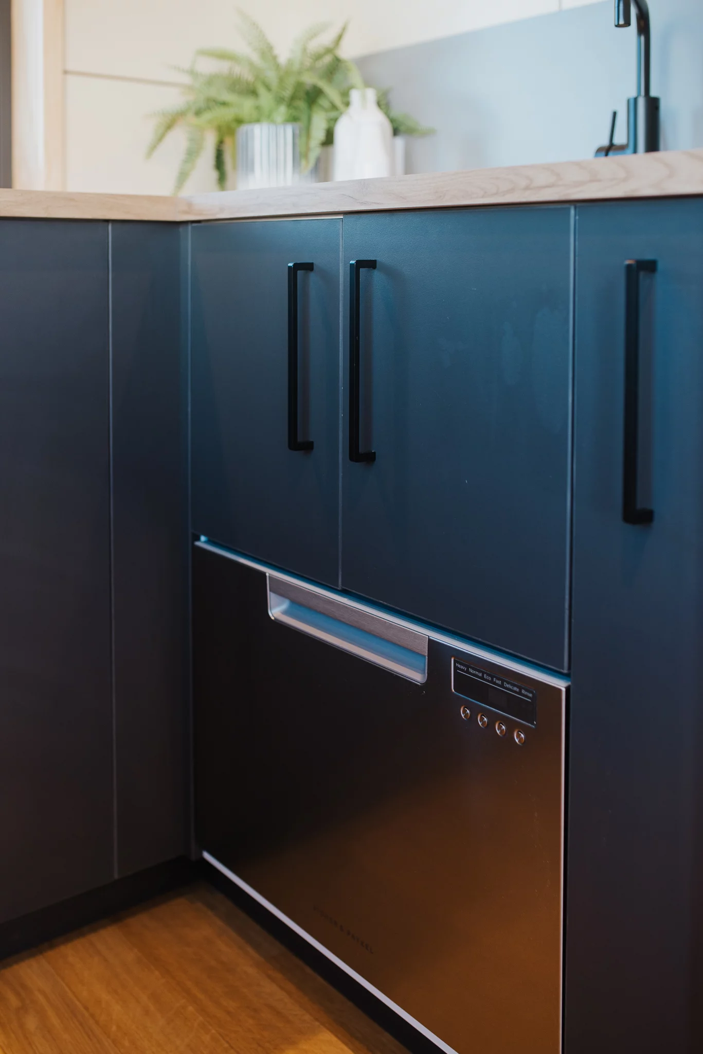 Scotty The Tiny House's kitchen includes a small dishwasher, which is a nice feature to have in a tiny house and a rarity outside of the larger North American models