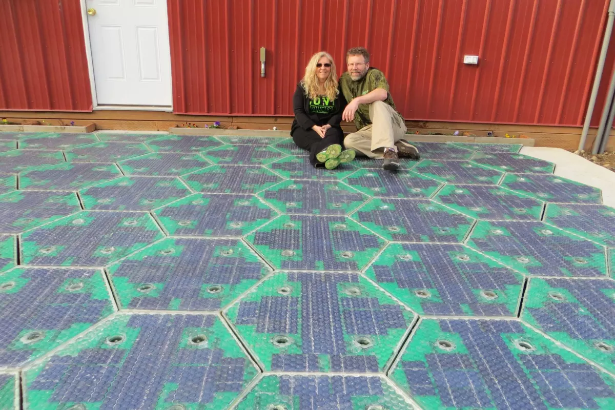 Scott and Julie Brusaw relax on the new parking lot