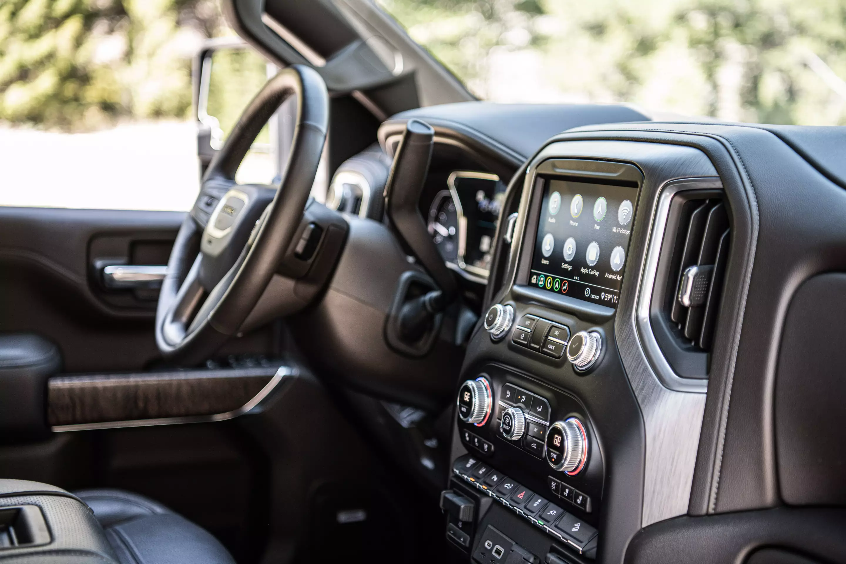 The very much truck interior of the 2020 GMC Sierra HD Denali is surprisingly comfortable for that