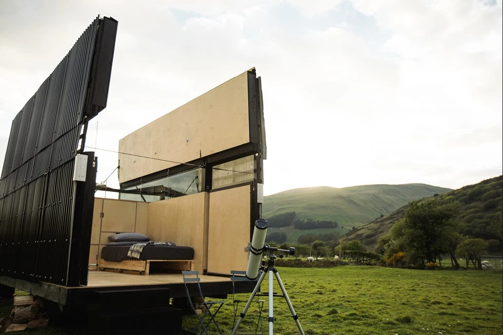 SkyHut transforms into a perfect spot to cuddle up next to the fire and enjoy some nighttime star gazing