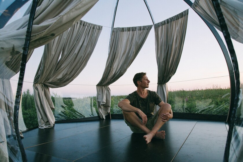 The internal circumference of the dome is equipped with a series of lightweight fabric curtains, which help provide shade from the sun and privacy during the evening