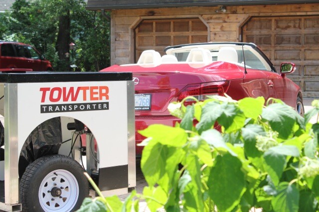 The Towter features a powered loading platform that lowers to the ground when the wheelchair (or scooter) is going on and coming off