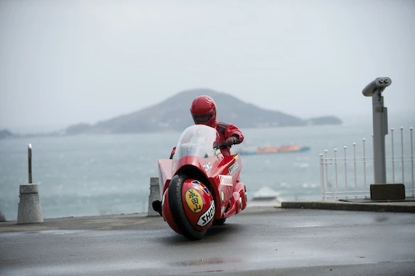 A movie-accurate replica of the motorcycle from the classic film Akira recently toured Japan to raise money for charity