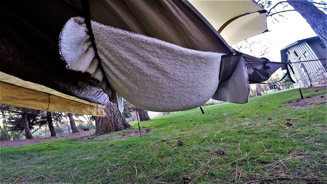 Creator Trent Johnson says that there's no squashing of the shoulders, swaying, or what he calls "cold butt syndrome," providing you stuff a blanket on the underside of the hammock with the provided strapping