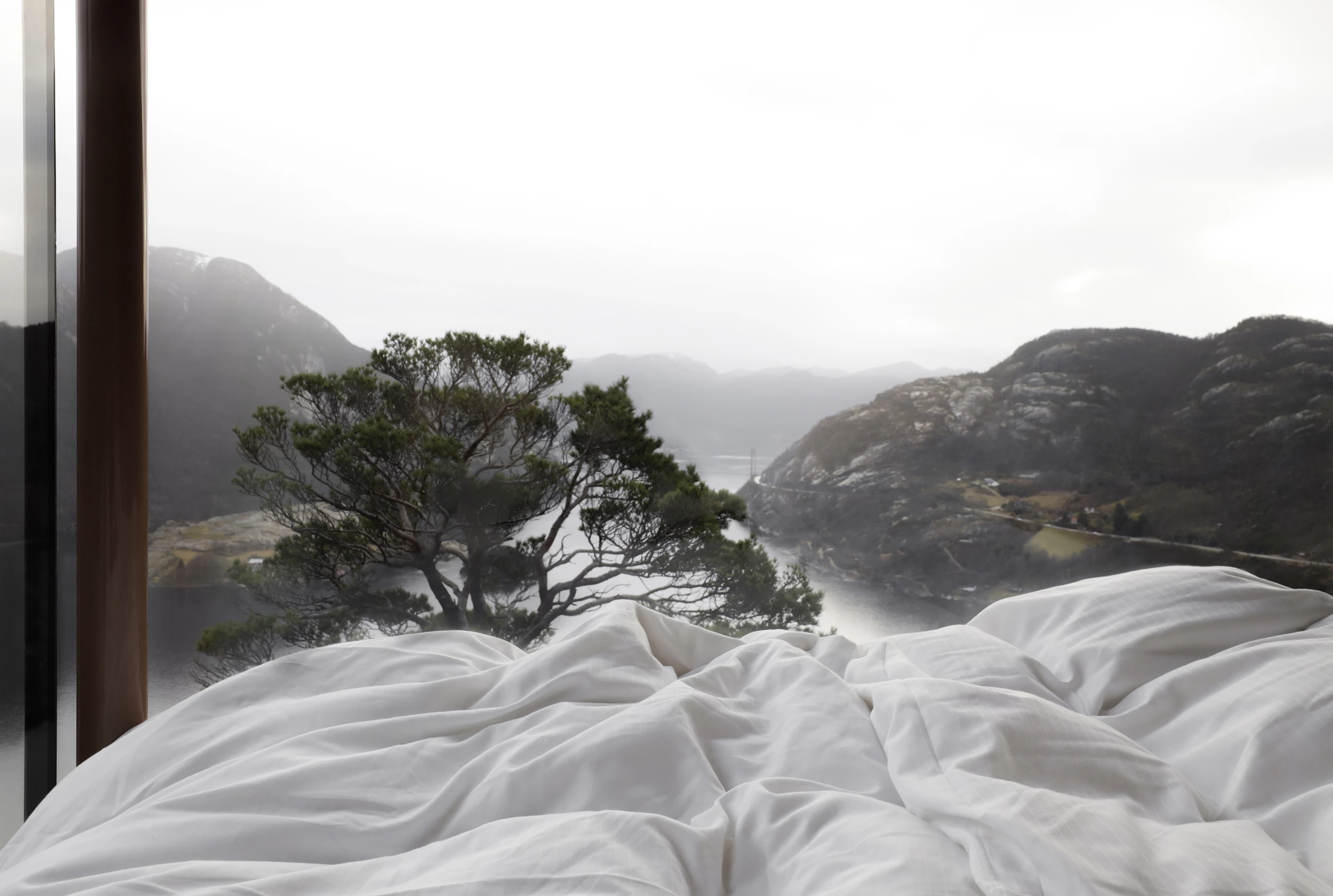 The Bolder Star Lodges feature generous glazing and are designed to make visitors feel like they're floating on the edge of the cliff