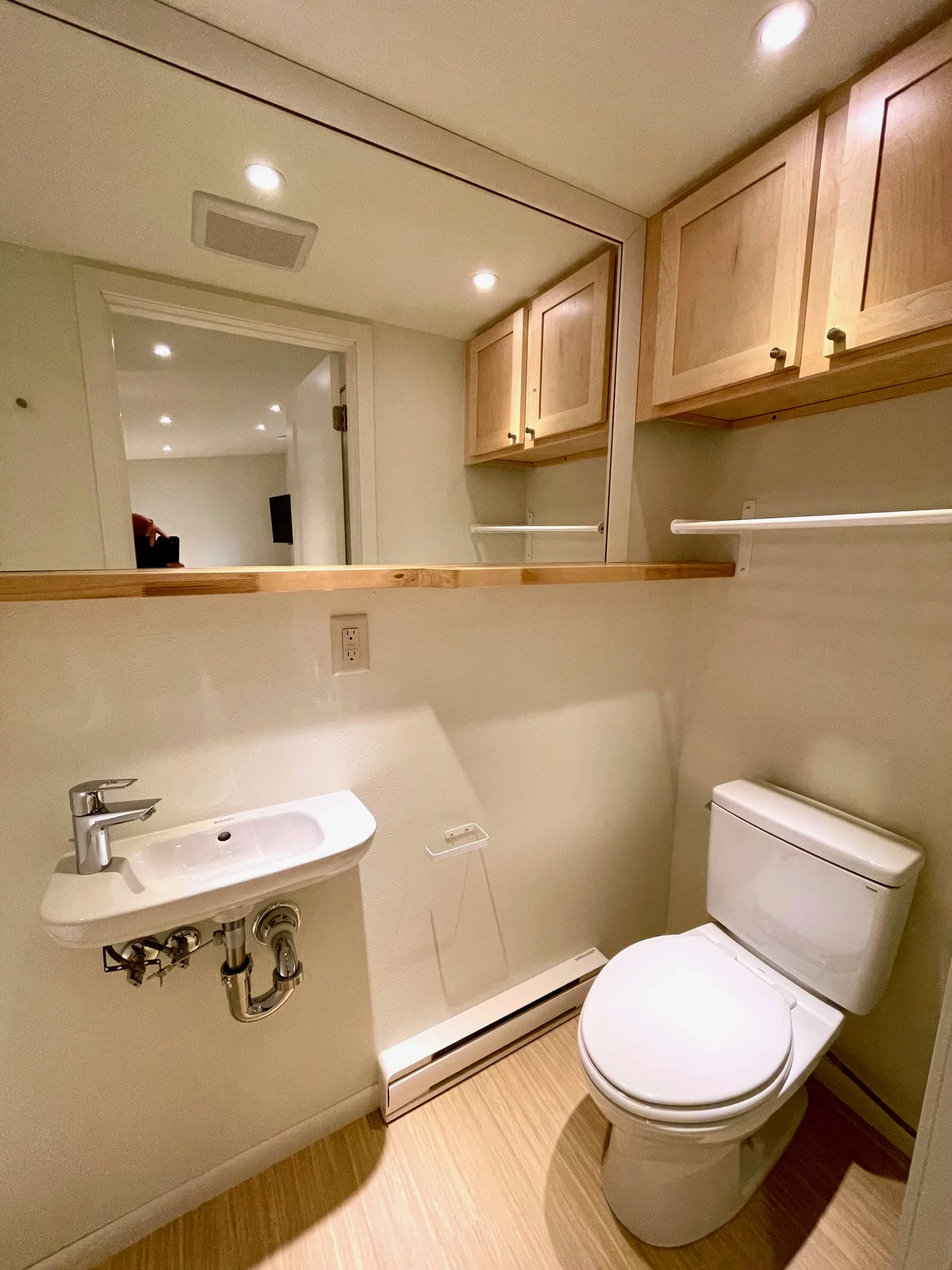 The bathrooms in the Boho Duplex have a small heater installed for comfort