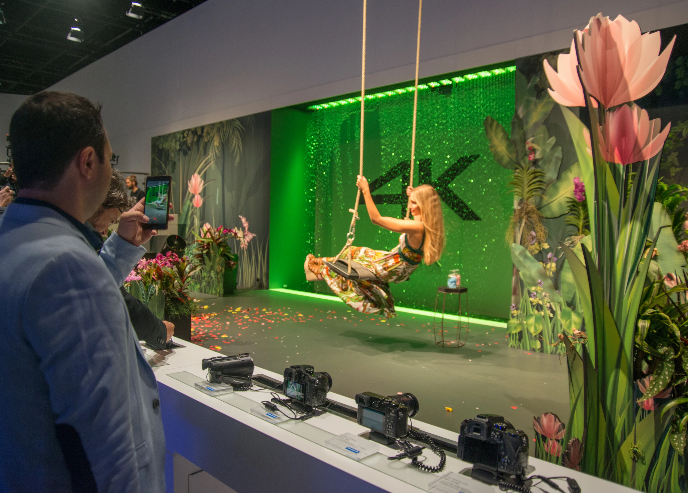 Panasonic had a model on a swing for people to take photos of, for some reason