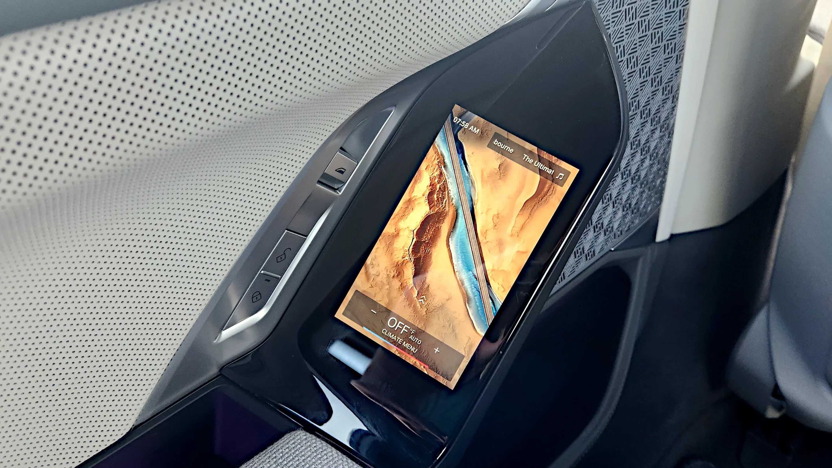 Back seat passengers in the 2023 BMW 760i have tablet-like control screens ahead of the armrests on the doors