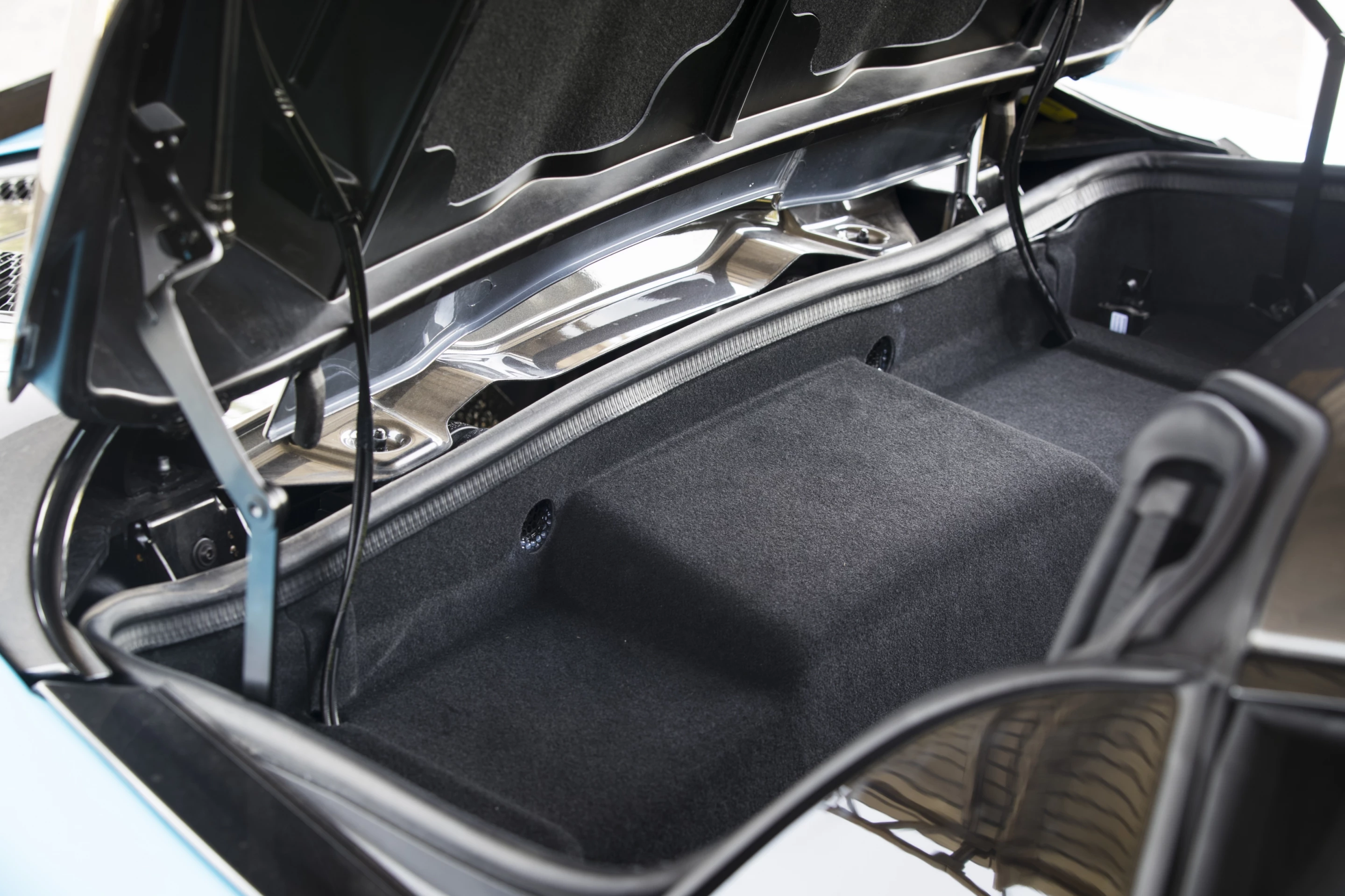 If the roof is left up, there is a small storage space available where it would be stored when down