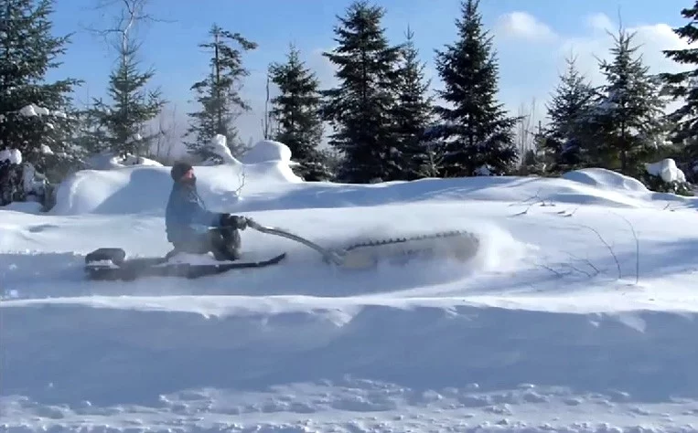 Sit down in a sled, grab hold of the MTT-136 and you have a highly maneuverable makeshift snowmobile