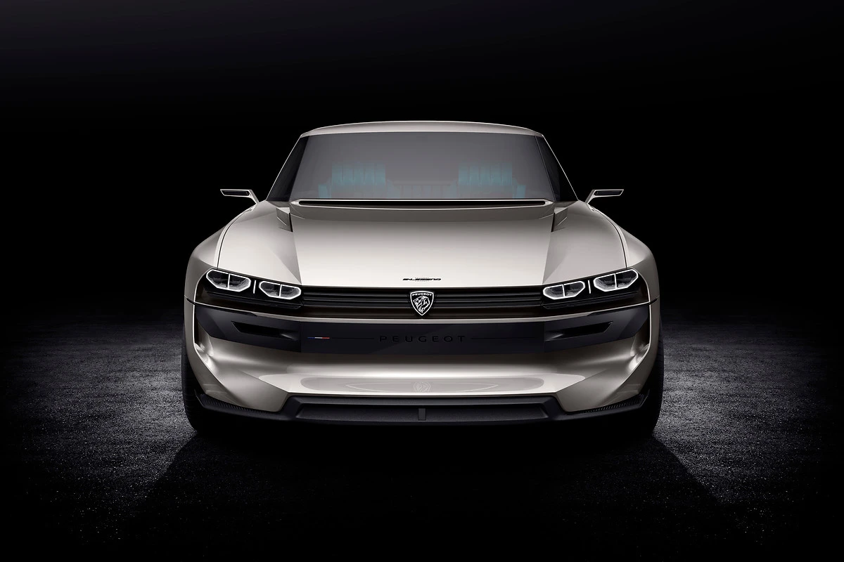With its curving top edge, the front-end bears resemblance to the Peugeots of old, particularly the 504 Coupe that served as its inspiration