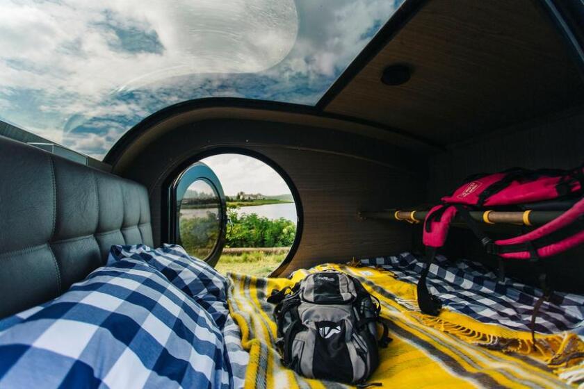 Inside, the Mink trailer includes a queen bed all made up and plenty of glass to enjoy the views
