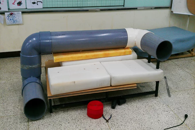 The Cat Tunnel Sofa features a play tunnel that runs along the arm, back and side of the sofa