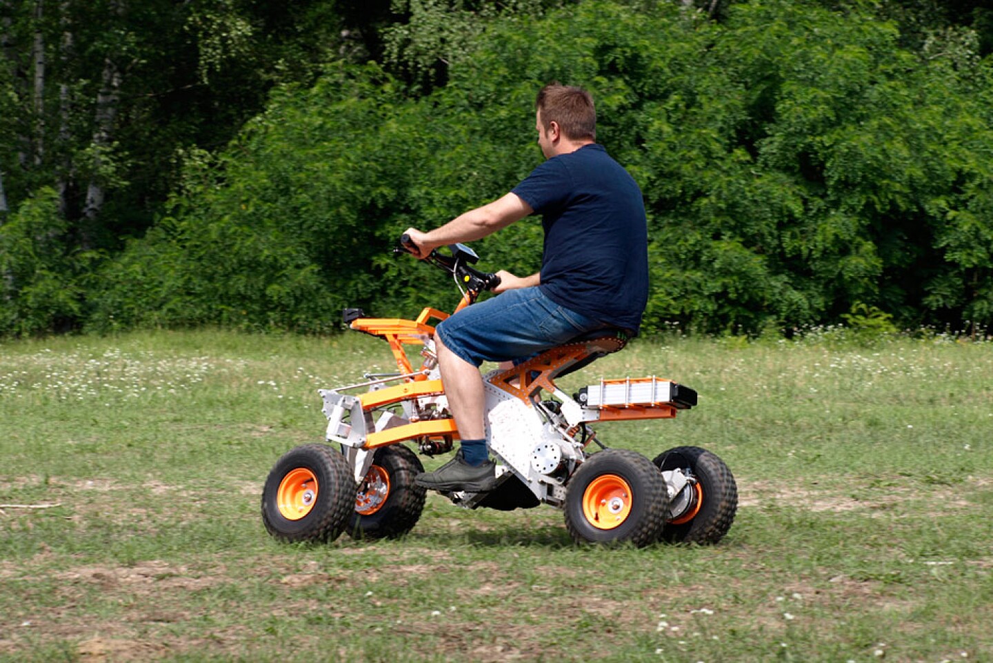 Tilting electric quad gets menacing offroad big brother