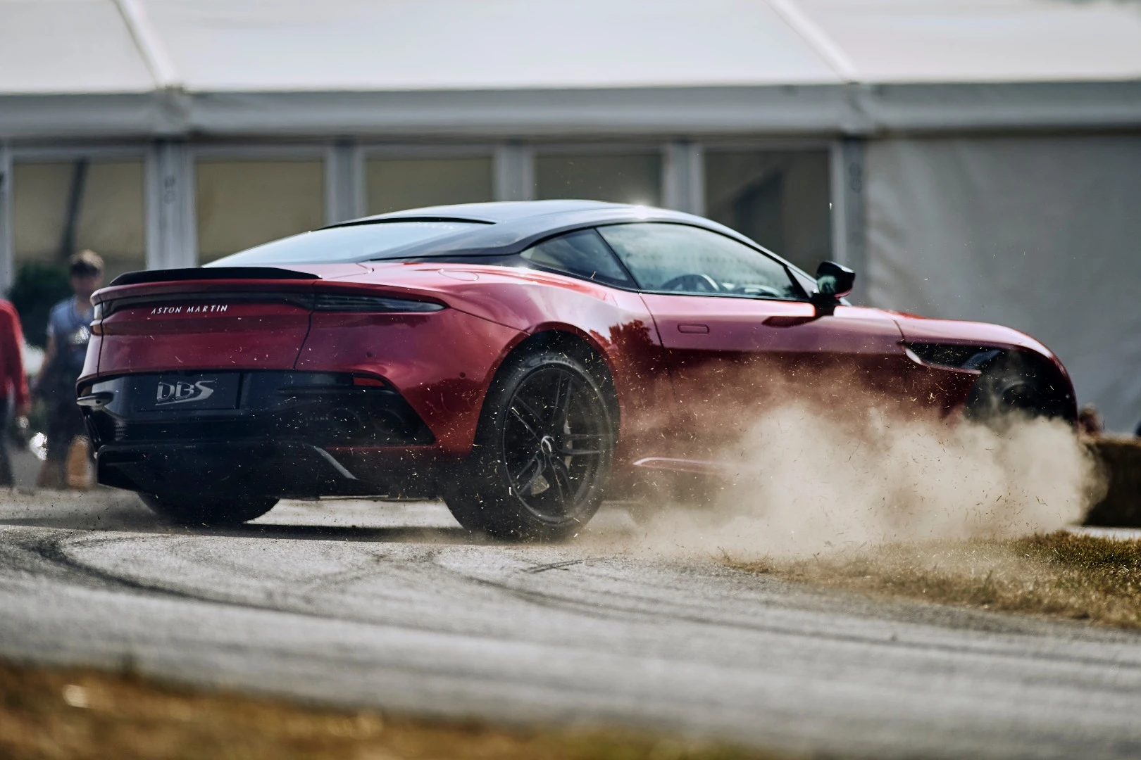 An Aston Martin DBS gets sideways at Goodwood