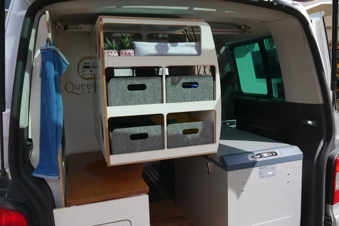 Another clever feature, the sliding storage shelf can be accessed from this angle or from inside the van
