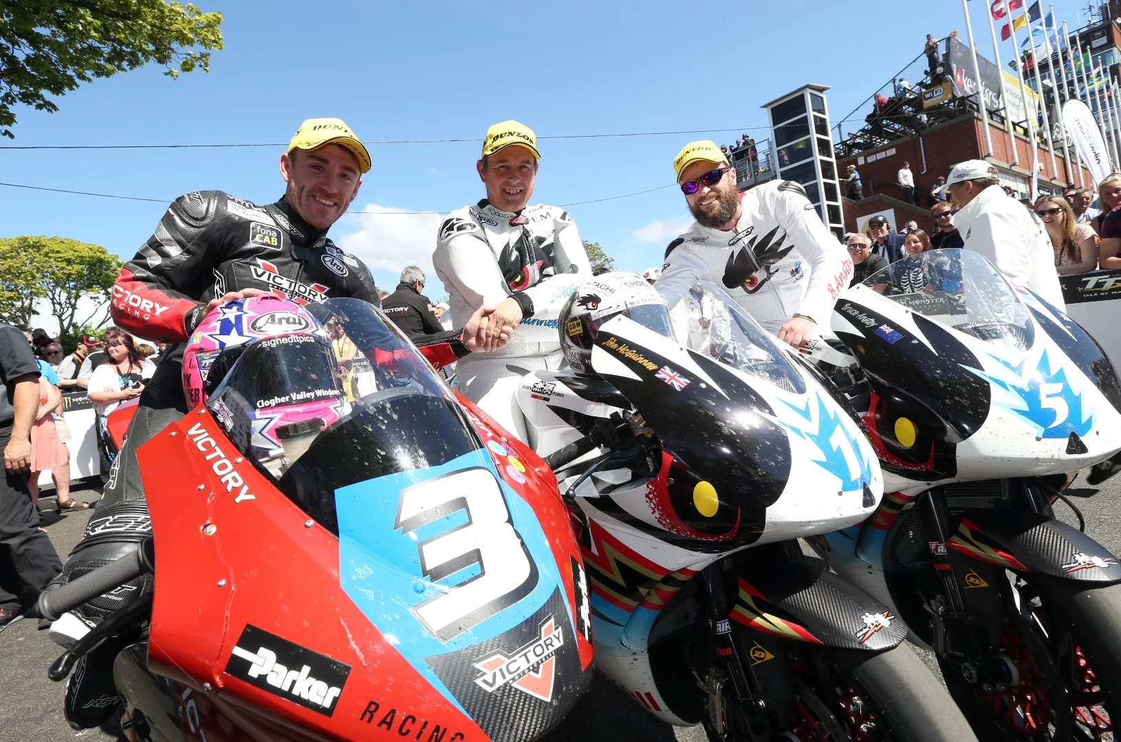 Three happy winners. From left to right, Lee Johnston (Victory), John McGuinness (Mugen), Bruce Anstey (Mugen)